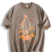 Y2K a Skeleton Hand Grasping a Heart and Flowers Vintage Washed T-Shirt in Brown