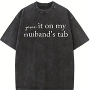 Put It on My Husband's Tab Vintage Washed T-Shirt in Black