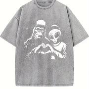 Retro Bigfoot and Alien Heart Hands Vintage Washed T-Shirt in Gray
