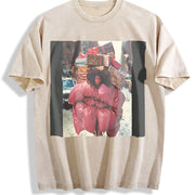 Woman Carrying Gifts in the Snow Vintage Washed T-Shirt in Beige