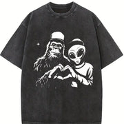 Retro Bigfoot and Alien Heart Hands Vintage Washed T-Shirt in Black