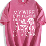 My Spouse Isn't Delicate Like a Flower; She's as Delicate Vintage Washed T-Shirt in Red