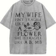 My Spouse Isn't Delicate Like a Flower; She's as Delicate Vintage Washed T-Shirt in Gray