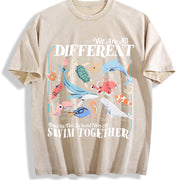 We Are All Different Swim Together Teacher Back to School Vintage Washed T-Shirt in Beige