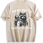 On My Way to Make the Vibe Weird Raccoon Vintage Washed T-Shirt in Beige