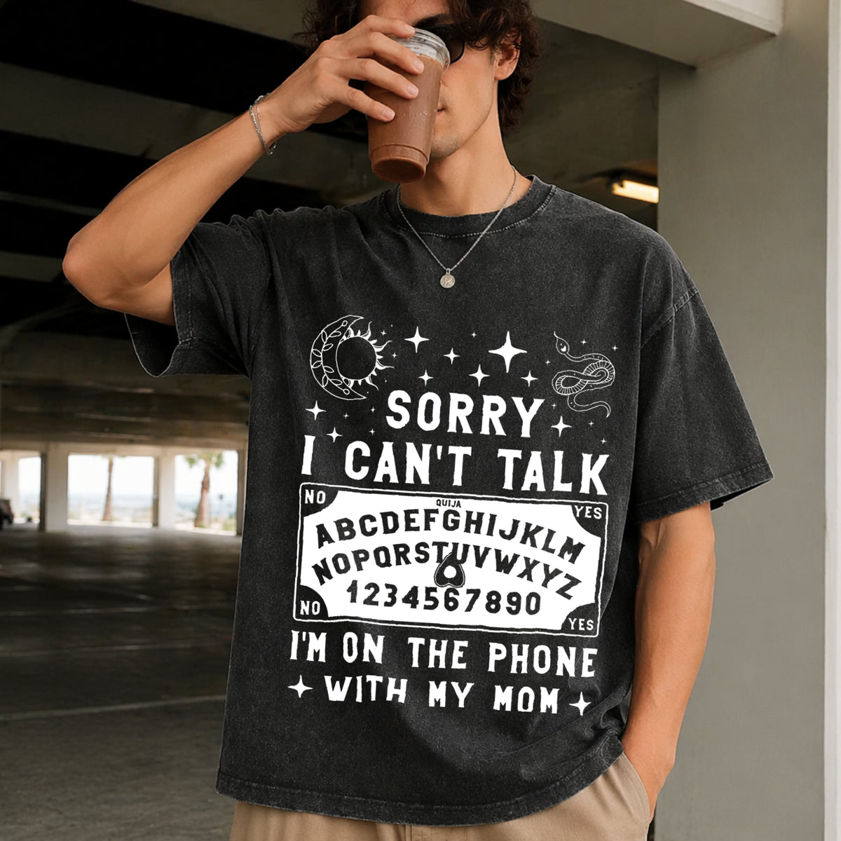 Sorry I Can't Talk I'm on the Phone with My Mom Ouija Vintage Washed T-Shirt in Black