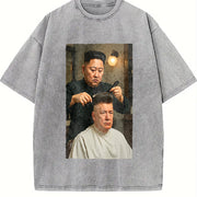 Kim Jong Un Cutting Donald Trump's Hair (Us) Vintage Washed T-Shirt in Gray
