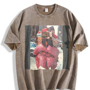 Woman Carrying Gifts in the Snow Vintage Washed T-Shirt in Brown