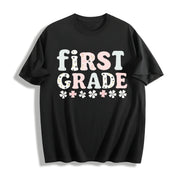 First Grade Teacher Cotton T-Shirt in Black
