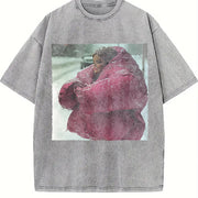 Woman in a Pink Coat in the Snow Vintage Washed T-Shirt in Gray