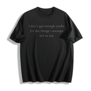 I Don't Get Enough Credit for the Things I Mange Not Say Cotton T-Shirt in Black