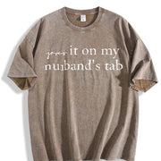 Put It on My Husband's Tab Vintage Washed T-Shirt in Brown
